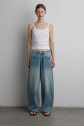 27" CURVE LEG MID RISE DENIM JEAN