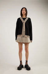 OVERSIZED VARSITY BUTTON UP CARDIGAN